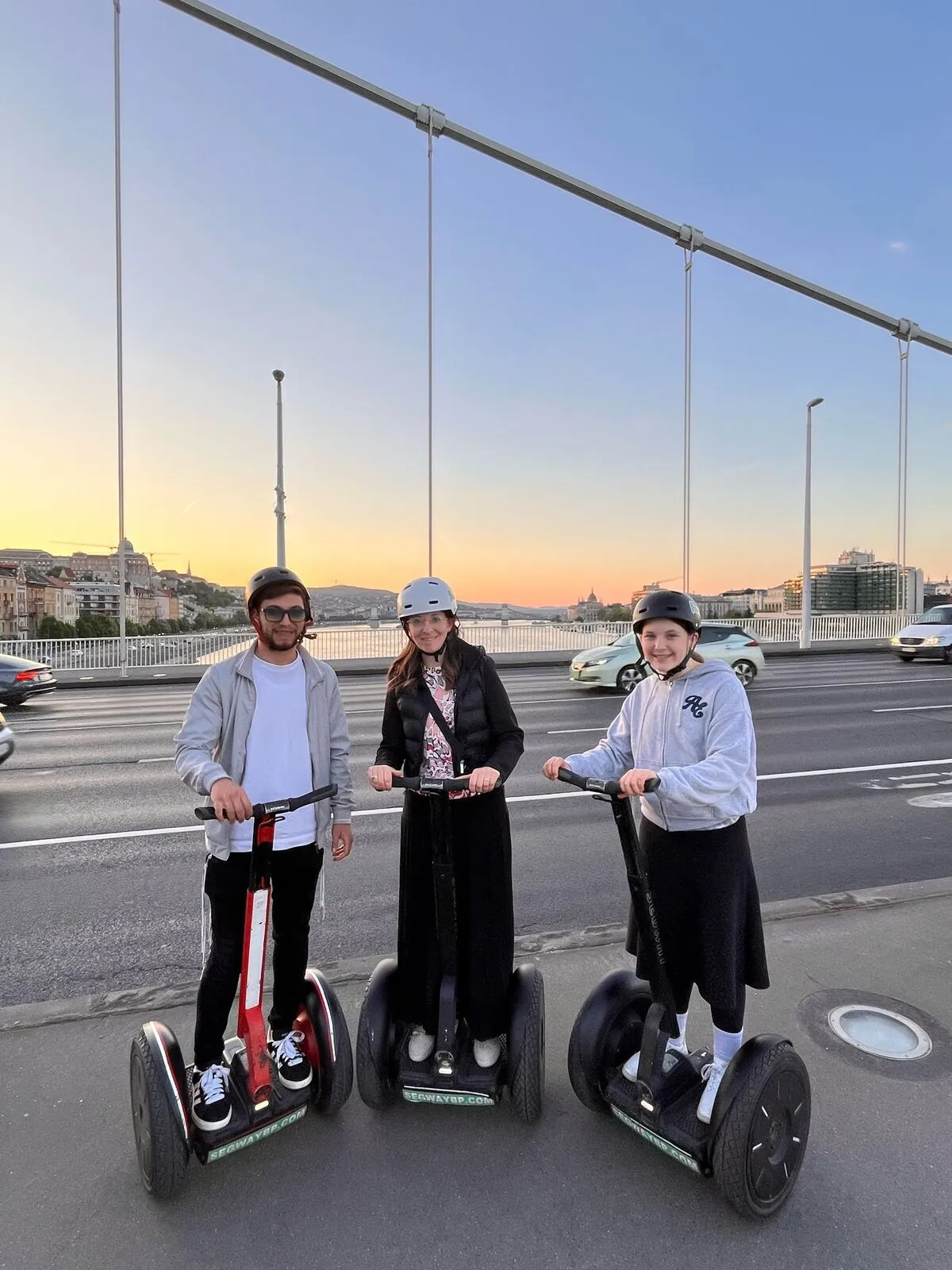 Segway riders at sunset over the Danube